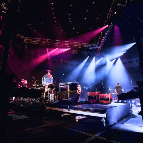 Live performance with dramatic stage lighting